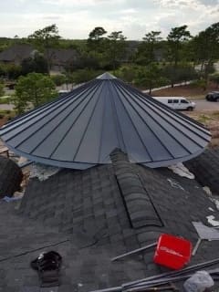 A large metal roof on top of a building.